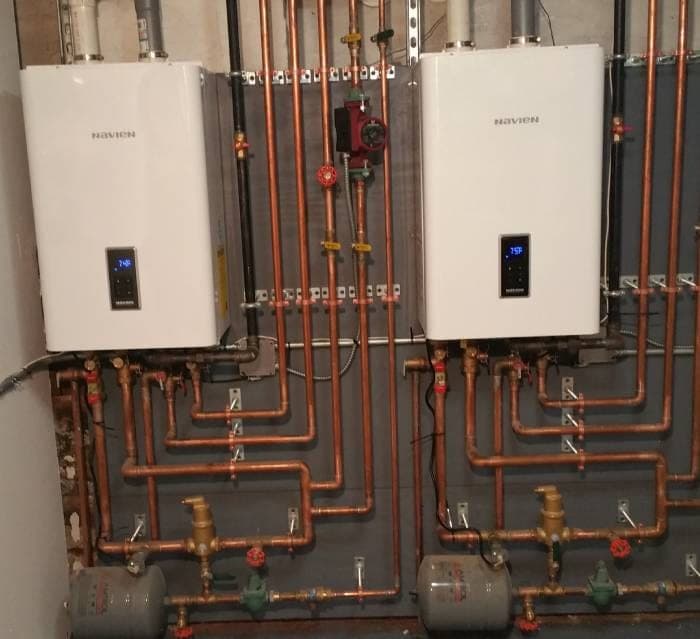 Wall-mounted high-efficiency water heaters with copper piping