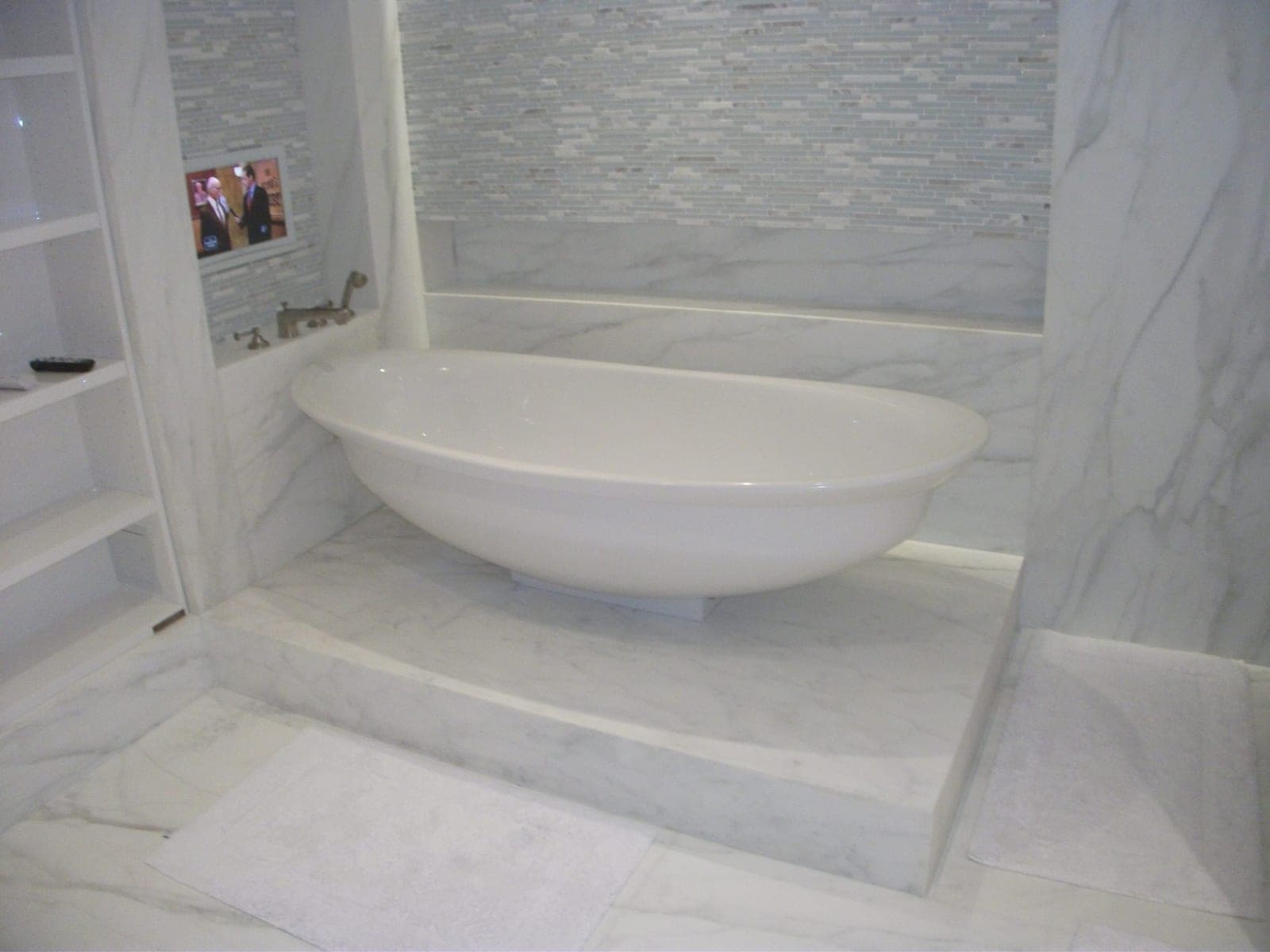 Marble bathroom with a freestanding tub