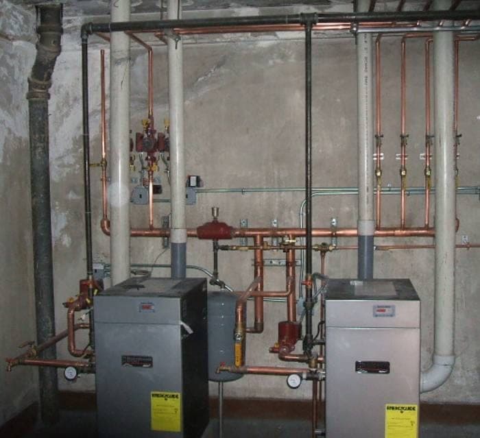 Commercial boiler room with twin boilers